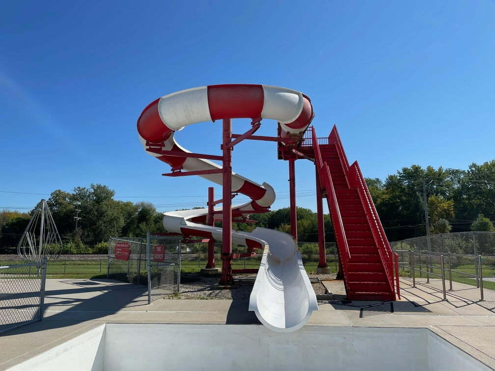 Webster City Outdoor pool slide undergoing maintenance