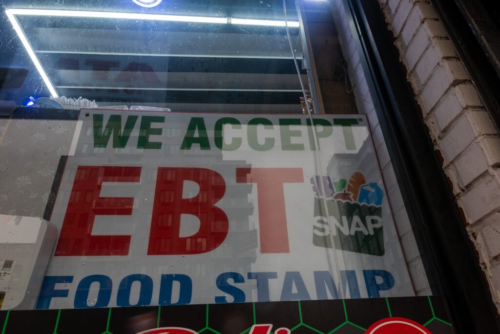 Trump administration threatens to yank food stamps funding from Democratic-led states 1 A store displays a sign accepting Electronic Benefits Transfer, or EBT, cards for Supplemental Nutrition Assistance Program purchases for groceries on Oct. 30, 2025 in New York City. (Photo by Spencer Platt/Getty Images)